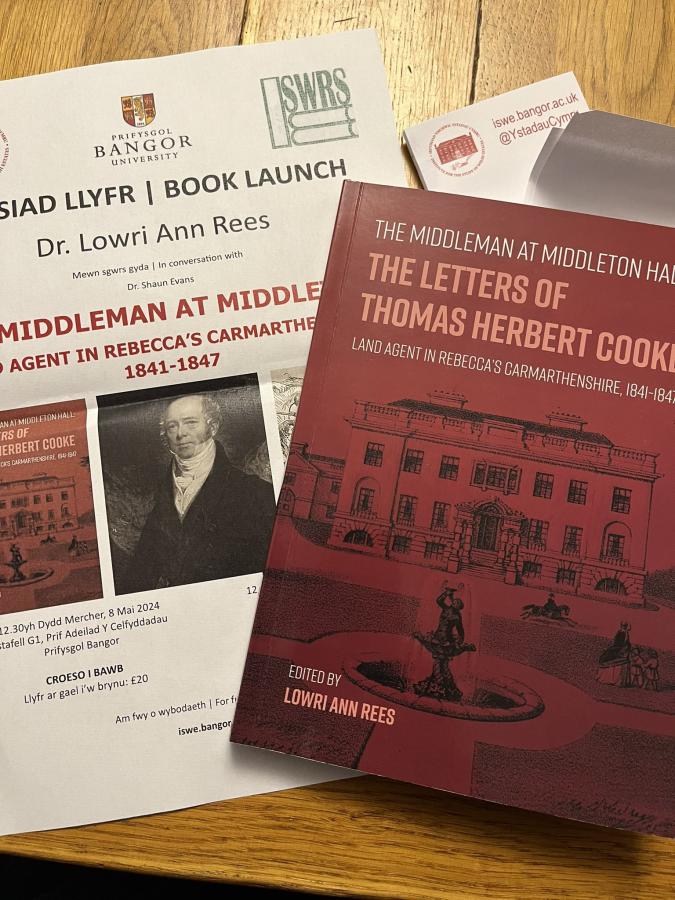 Dr Lowri Ann Rees' book and a leaflet advertising the book launch