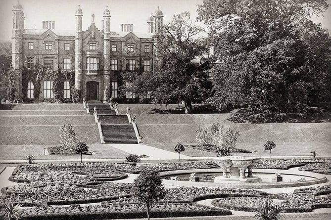 Black and white photograph of Glanusk, a house in the Gothic style with terraces descending to a Parterre Garden. 
