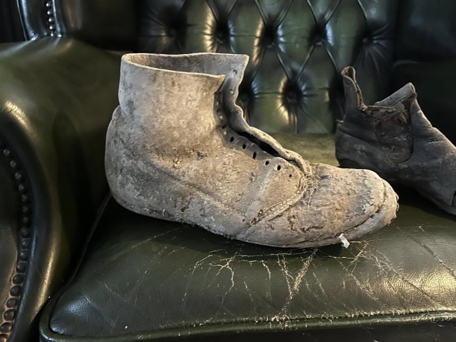 Photograph of an old, worn shoe