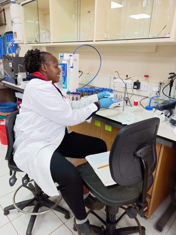 Caroline analysing soil texture at the Mazingira Centre Soil Laboratory