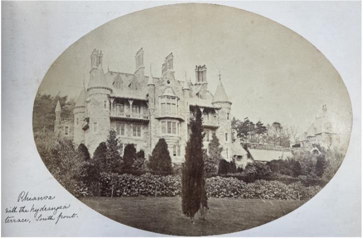 Sepia photograph of a Gothic house with turrets