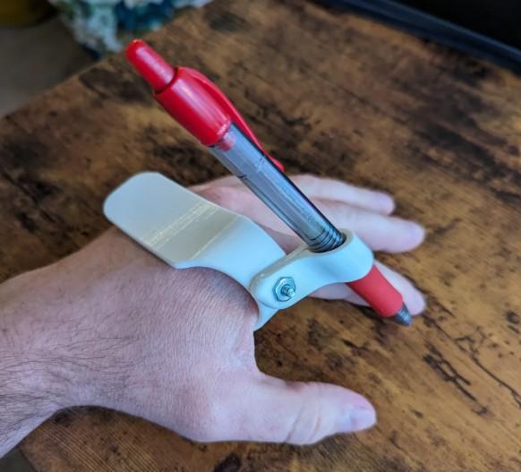 Image of an adaptation to hold a pen