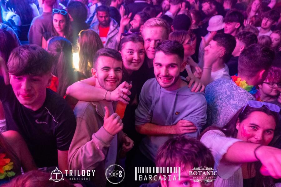 Students dancing and socialising in a nightclub